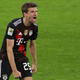 Bayern’s Thomas Muller shouts out and celebrates after the end of the German Bundesliga soccer match between RB Leipzig and Bayern Munich.